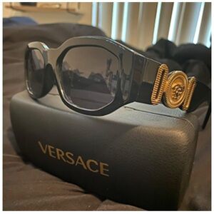 Versace Women's Sunglasses with Black Frame and Gold Medallion